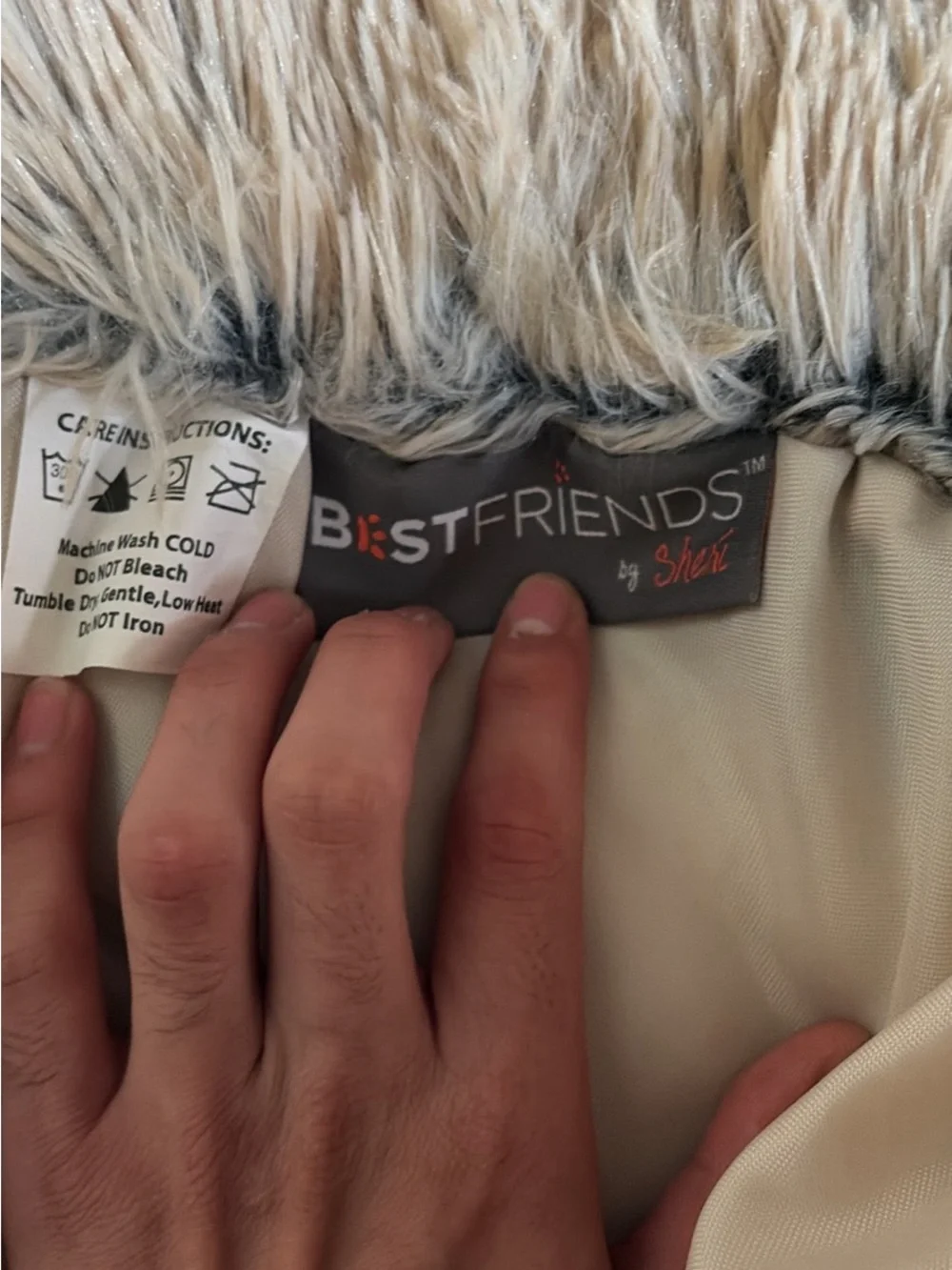 Best friends by Sheri shaggy donut bed